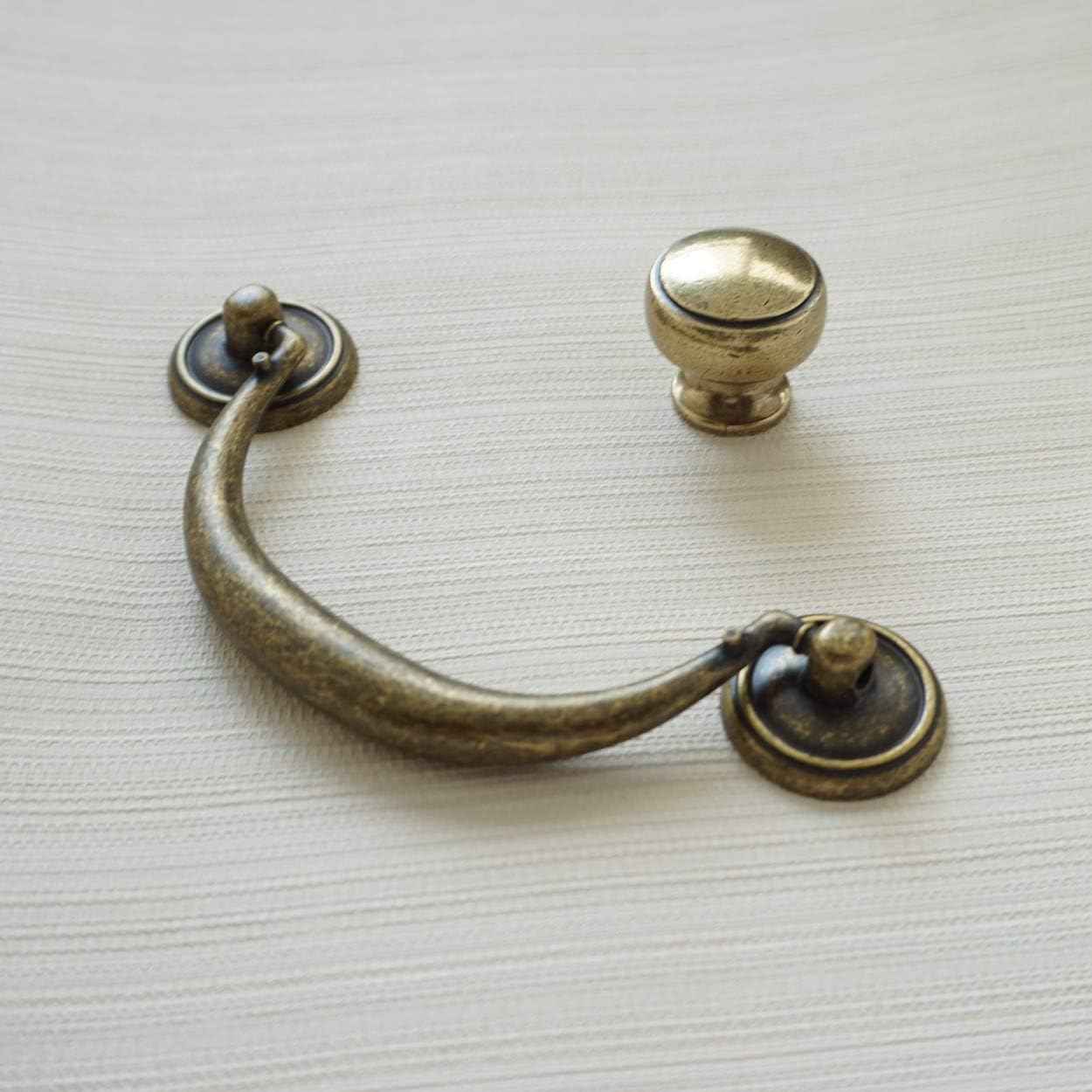 Tiradores de gabinete de bronc - Furniture Hardware Drop Pulls reseña y precio